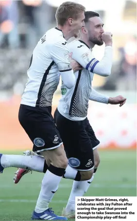  ??  ?? > Skipper Matt Grimes, right, celebrates with Jay Fulton after scoring the goal that proved enough to take Swansea into the Championsh­ip play-off final