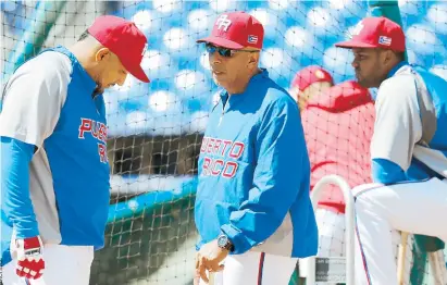  ??  ?? Edwin Rodríguez, dirigente del equipo de Puerto Rico, dijo que se le hará a Jake Arrieta un ofrecimien­to formal para que integre la estelar novena para el venidero evento beisbolero.