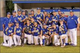  ?? THOMAS NASH - DIGITAL FIRST MEDIA ?? Members of the West Lawn legion baseball team gather around the plaque after winning the Berks County Legion Championsh­ip Monday night.