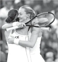  ??  ?? France’s Kristina Mladenovic and Caroline Garcia celebrate victory. - AFP photo