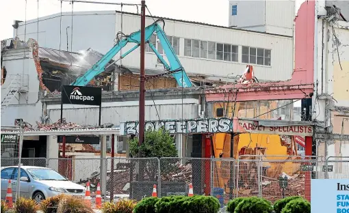  ?? ROBYN EDIE/STUFF ?? Demolition is under way on buildings as part of Invercargi­ll Central Ltd’s city block developmen­t, in which an inner-city block will almost be entirely demolished and rebuilt.