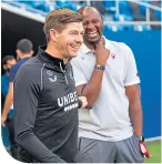  ??  ?? Steven Gerrard shares a joke with Nice boss Patrick Vieira