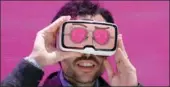  ?? REUTERS ?? A man tests the “Zeiss VR One” virtual reality glasses during the Mobile World Congress in Barcelona, Spain.