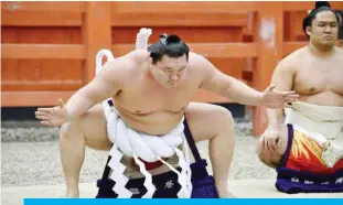  ??  ?? Sumo wrestler gets ready for action.