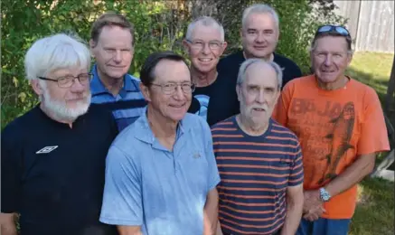  ?? IAN STEWART, SPECIAL TO THE RECORD ?? Prostate cancer survivors, clockwise from left, George Malon, Ken Steele, Bill Faulkner, John Baxter, Walter Pfeifer, John Clark and Jim Oakley want Ontario to fund robotic prostate cancer surgery. The Ministry of Health says it hasn’t made a decision.