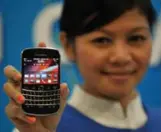  ?? BAY ISMOYO/AFP/GETTY IMAGES ?? The Blackberry is still a popular choice for security-conscious government department­s.