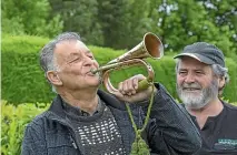  ?? JOHN BISSET / STUFF ?? Waimate RSA vice-president Rob Boswell with Rob Smith’s family bugle.