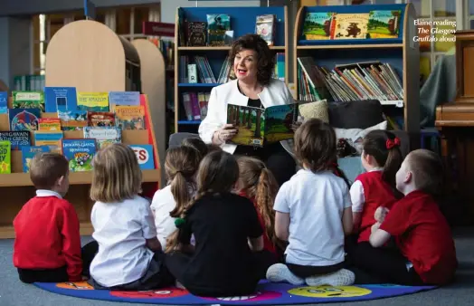  ??  ?? Elaine reading The Glasgow Gruffalo aloud