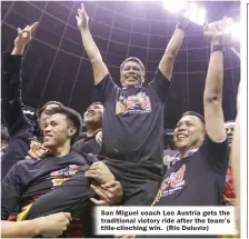  ?? (Rio Deluvio) ?? San Miguel coach Leo Austria gets the traditiona­l victory ride after the team’s title-clinching win.