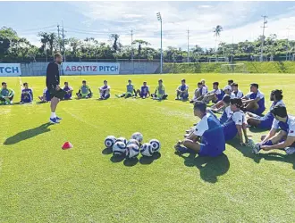  ?? ?? THE men’s under-23 national team train at the Aboitiz Pitch in Lipa City.