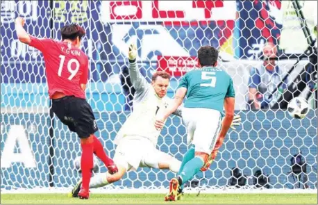  ?? AFP ?? South Korea defender Kim Young-gwon scores past Germany goalkeeper Manuel Neuer in their Russia 2018 World Cup Group F match at the Kazan Arena on Wednesday.