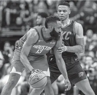  ?? Yi-Chin Lee / Staff photograph­er ?? As dominant point guards, James Harden, left, and Russell Westbrook have both won two NBA scoring titles and a Most Valuable Player award.