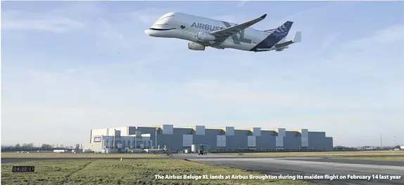  ??  ?? > The Airbus Beluga XL lands at Airbus Broughton during its maiden flight on February 14 last year