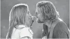  ?? CLAY ENOS ?? Ally (Lady Gaga) and Jackson Maine (Bradley Cooper) wow an audience in “A Star Is Born.”
