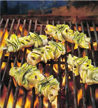  ?? ATCO BLUE FLAME KITCHEN. ?? Who says your grill always has to have meat? For a lighter touch, try these Zucchini Halloumi Skewers with Lemon Parsley Dressing. They make a great appetizer for a summer barbecue.