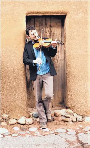 ?? COURTESY OF INGA HENDRICKSO­N ?? Jordan Wax plays violin and several other instrument­s in the band Lone Piñon. The band will perform a virtual concert on Friday, May 15.