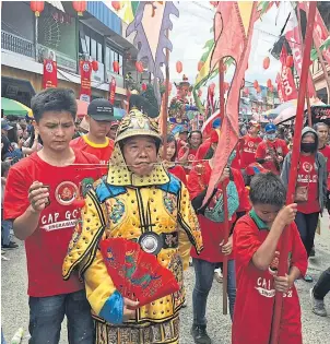  ??  ?? The annual parade of Tatung, people believed to have supernatur­al powers, is the highlight of the Chap Goh Mei celebratio­ns in Singkawang, West Kalimantan.