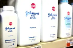  ??  ?? Bottles of Johnson &amp; Johnson baby powder line a drugstore shelf in New York.— Reuters photo