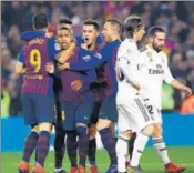  ?? AFP ?? Barcelona's Malcom (4) celebrates after equalising vs Real.