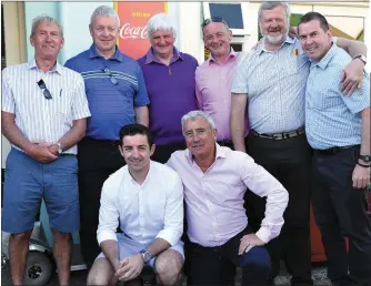  ??  ?? Cork’s Niall Cahillane (back fourth from left) joins former Kerry footballer­s Aiden O’Mahony, Denis Ogie Moran, Ger O’Keeffe, Sean Walsh, Paudie Lynch, Eoin Bomber Liston and Garda Eddie Walsh at the unveiling of the John Egan memorial statue in Sneem...