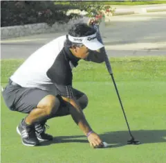  ?? (Photo: Paul Reid) ?? American David Morland lines up a birdie putt on the
18th hole during yesterday’s Pro-am of the 53rd JGA Open at Tryall Club. Morland was second in the event last year.