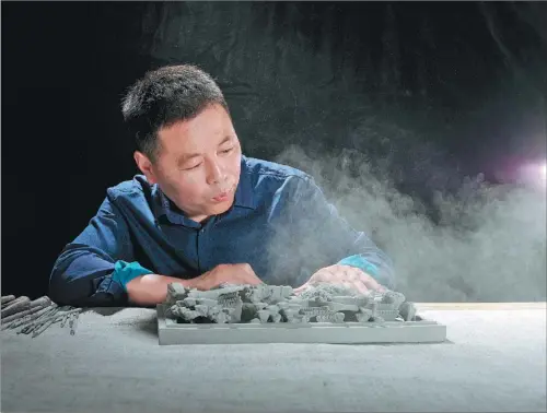  ?? PROVIDED TO CHINA DAILY ?? Wu Zhenghui has dedicated himself to the art of brick carving for 28 years.