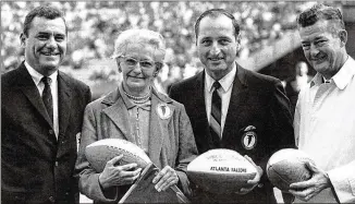  ?? AJC 1966 ?? Then-Falcons owner Rankin Smith (from left), Julia Elliott, former Georgia coach Vince Dooley and former Atlanta Constituti­on sports editor Jesse Outlar in 1966; Elliott was credited with the Falcons name.
