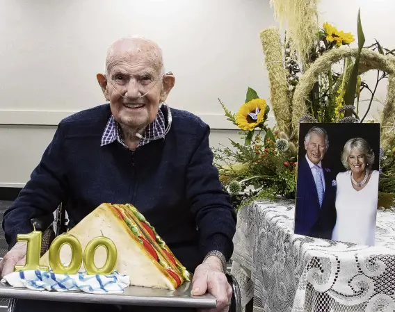  ?? PHOTO: SANDY EGGLESTON ?? Centenaria­n . . . Windsor Park Care Home resident Tom Heslip celebrates his 100th birthday in Gore yesterday.