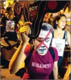  ?? ERNESTO BENAVIDES/AFP ?? Demonstrat­ors march during a protest against the pardon granted by Peruvian President Pedro Pablo Kuczynski to former President Alberto Fujimori, in Lima, on January 11.