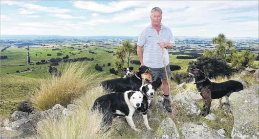  ?? PHOTO: STEPHEN JAQUIERY ?? Ready to go, boss . . . Warepa Collie Club member Robin McKenzie and his dogs Kip, Slade, Dice, Paul and Ralph overlook the club’s grounds in South Otago.