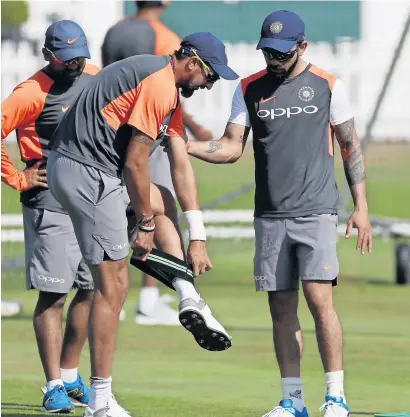  ?? — Reuters file ?? India’s Virat Kohli (right) and Ishant Sharma were picked by Atul Wassan to play for Delhi.