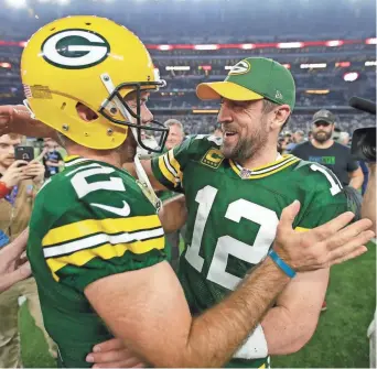  ?? DAN POWERS, USA TODAY SPORTS ?? Packers kicker Mason Crosby, left, celebrates his winning field goal Sunday with quarterbac­k Aaron Rodgers. They will face the Falcons in the NFC Championsh­ip Game.