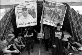  ??  ?? Iraqi demonstrat­ors gather at a memorial for a protester, who was killed last night during the ongoing anti-government protest. (Photo: Reuters)