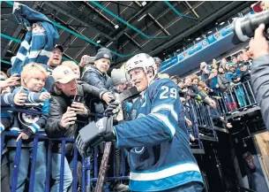  ?? MARTTI KAINULAINE­N THE ASSOCIATED PRESS ?? Finnish forward Patrik Laine of Winnipeg Jets scored four goals in two NHL games held in Helsinki last week. Both games sold out almost immediatel­y after tickets went on sale.