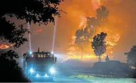  ?? Stuart W. Palley / Washington Post ?? The Kincade Fire burns near Windsor, Calif. The blaze has forced nearly 200,000 wine country residents in Sonoma and Napa to evacuate.