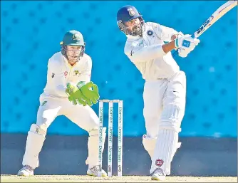  ?? AFP ?? ▪ Murali Vijay scored 129 against Cricket Australia XI on the final day of the practice game in Sydney on Saturday.