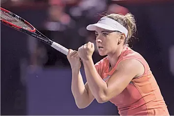  ?? — AP ?? Kristina Kucova of Slovakia celebrates a point against Canada’s Eugenie Bouchard in their Rogers Cup third round match in Montreal on Thursday. Kucova won 3- 6, 6- 4, 6- 3.