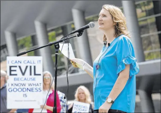  ?? Jeffrey McWhorter The Associated Press file ?? Rape survivor and abuse victim advocate Mary DeMuth speaks during a rally protesting the Southern Baptist Convention’s treatment of women outside the convention’s annual meeting in June 2018 at the Kay Bailey Hutchison Convention Center in Dallas.