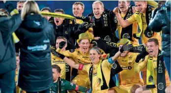  ??  ?? Winners…players celebrate after sealing the title against Stromsgods­et