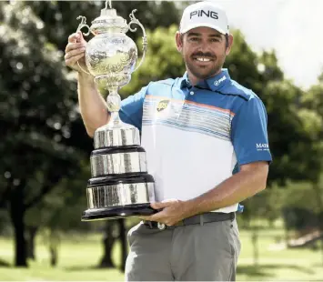  ?? | EPA ?? A PROUD Louis Oosthuizen with the South African Open trophy after his win at Randpark Golf Club yesterday.