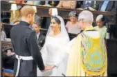  ?? REUTERS ?? Prince Harry and Meghan Markle at Windsor Castle during their wedding service on Saturday.