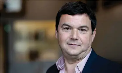  ??  ?? Thomas Piketty: ‘I refused these conditions and told them I would only accept a translatio­n with no cut of any sort.’ Photograph: Sander Koning/ANP/AFP via Getty Images