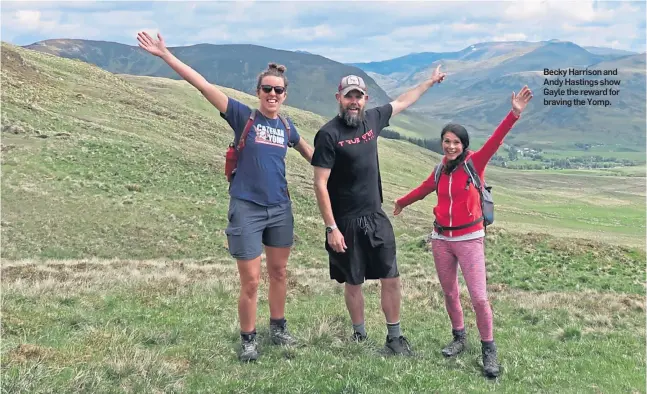  ??  ?? Becky Harrison and Andy Hastings show Gayle the reward for braving the Yomp.