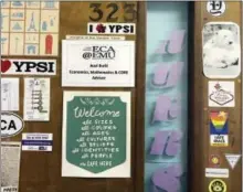  ?? MARCY DAVY VIA AP ?? This undated photo shows the “Welcome All” sign, center at bottom, created by Marcy Davy, on a classroom office door at the Early College Alliance on Eastern Michigan University’s campus in Ypsilanti, Mich.