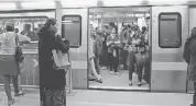  ?? YIRMIYAN ARTHUR/THE ASSOCIATED PRESS ?? Indian women travel inside a women-only metro train compartmen­t in New Delhi.