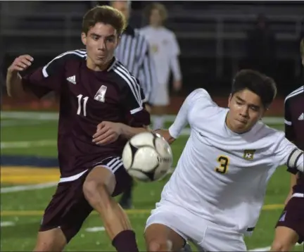  ?? PETE BANNAN — DIGITAL FIRST MEDIA ?? Abington’s Bryce Lexow (11) and Central Bucks West’s Nick Centenera (3) mix it up in the PIAA District 1 Championsh­ip at Upper Merion High School Satrurday night.