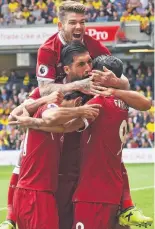  ??  ?? SHORT-LIVED JOY Reds celebrate Salah goal