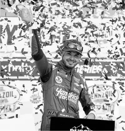  ?? JOHN LOCHER/AP ?? Kyle Larson celebrates after winning his seventh career NASCAR Cup race Sunday at Las Vegas Motor Speedway.