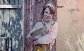  ?? Photograph: Phil Fisk/The Observer ?? Back to nature: Rebecca Schiller with one of her young goats.