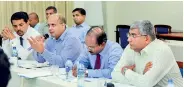  ??  ?? INSEE Cement and PIM Directors evaluating the final project presentati­on of the participan­ts